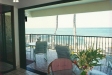 View of Hale Pōhaku living room towards lānai and ocean